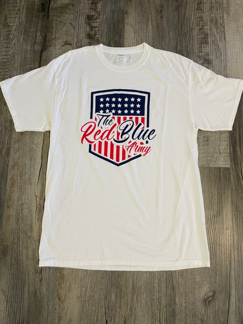 Port and Company White Graphic Tee with Red and Blue Shield Design